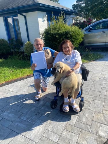 Pawrade customer Frank C. with their Golden Retriever puppy