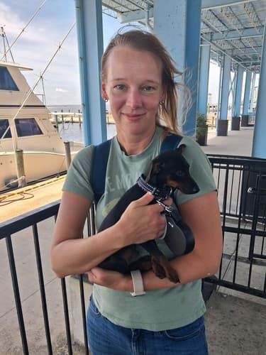 Pawrade customer Christina R. with their Miniature Pinscher puppy