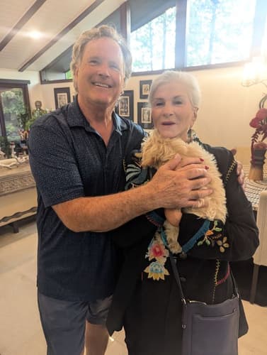 Pawrade customer John A. with their Malti Poo - Maltipoo puppy