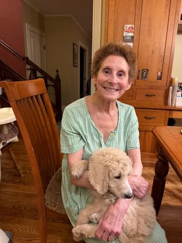 Pawrade customer Mimi K. with their Goldendoodle puppy