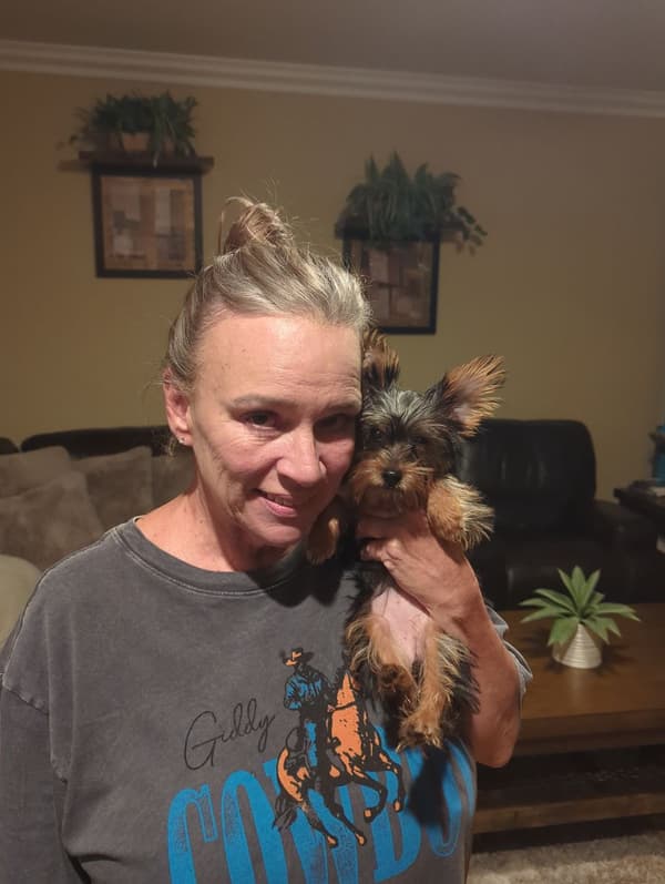 Ronda T. with Emily, a Yorkie puppy