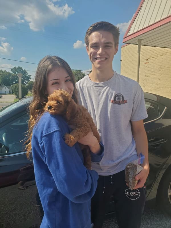 Customer photo of Cavapoo puppy from Caitlin P.