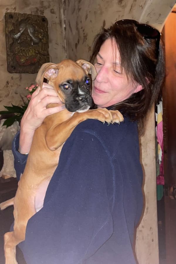 Customer photo of Boxer puppy from Angela C.