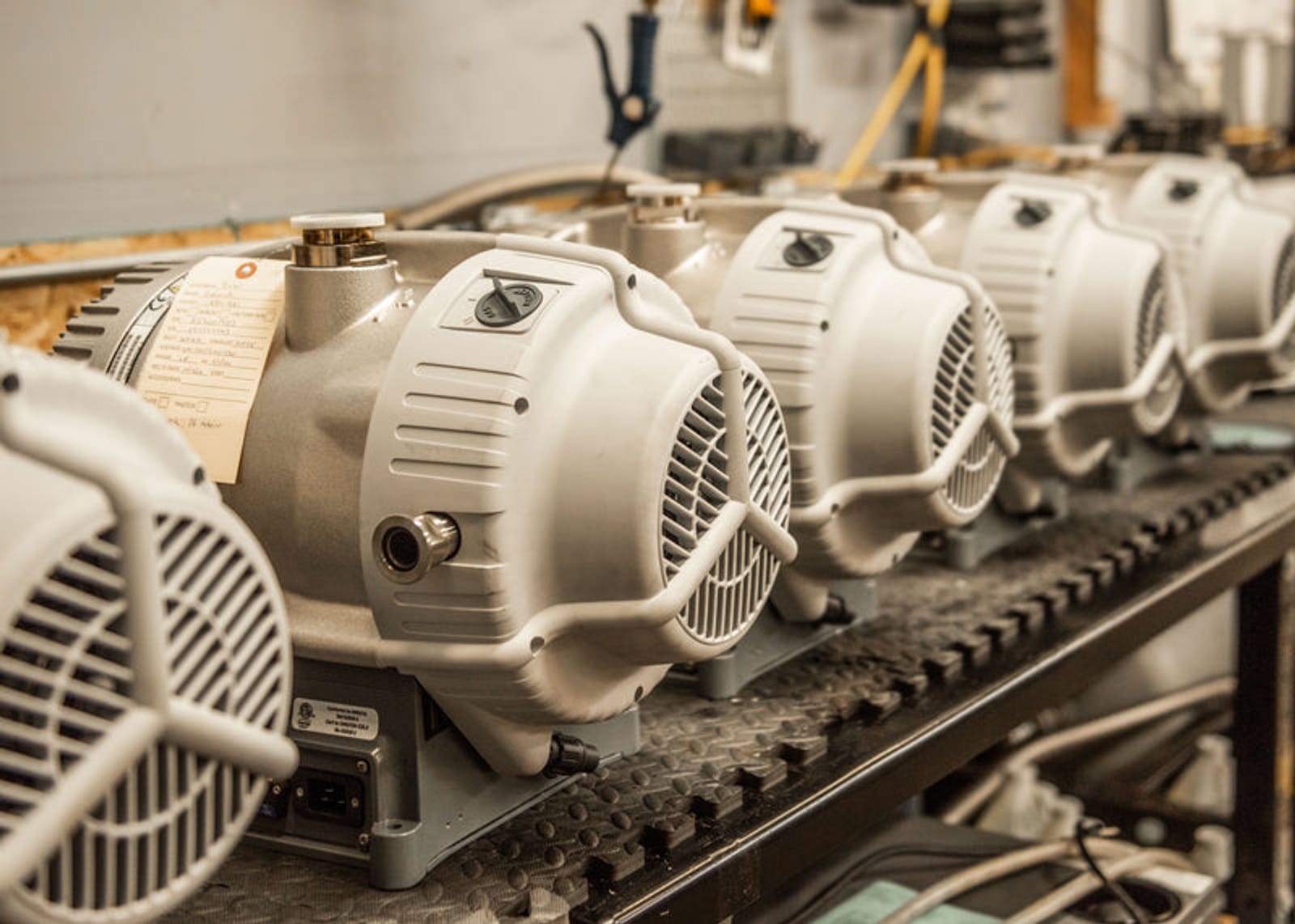 Ship, Service, Deliver vacuum pump and helium detectors