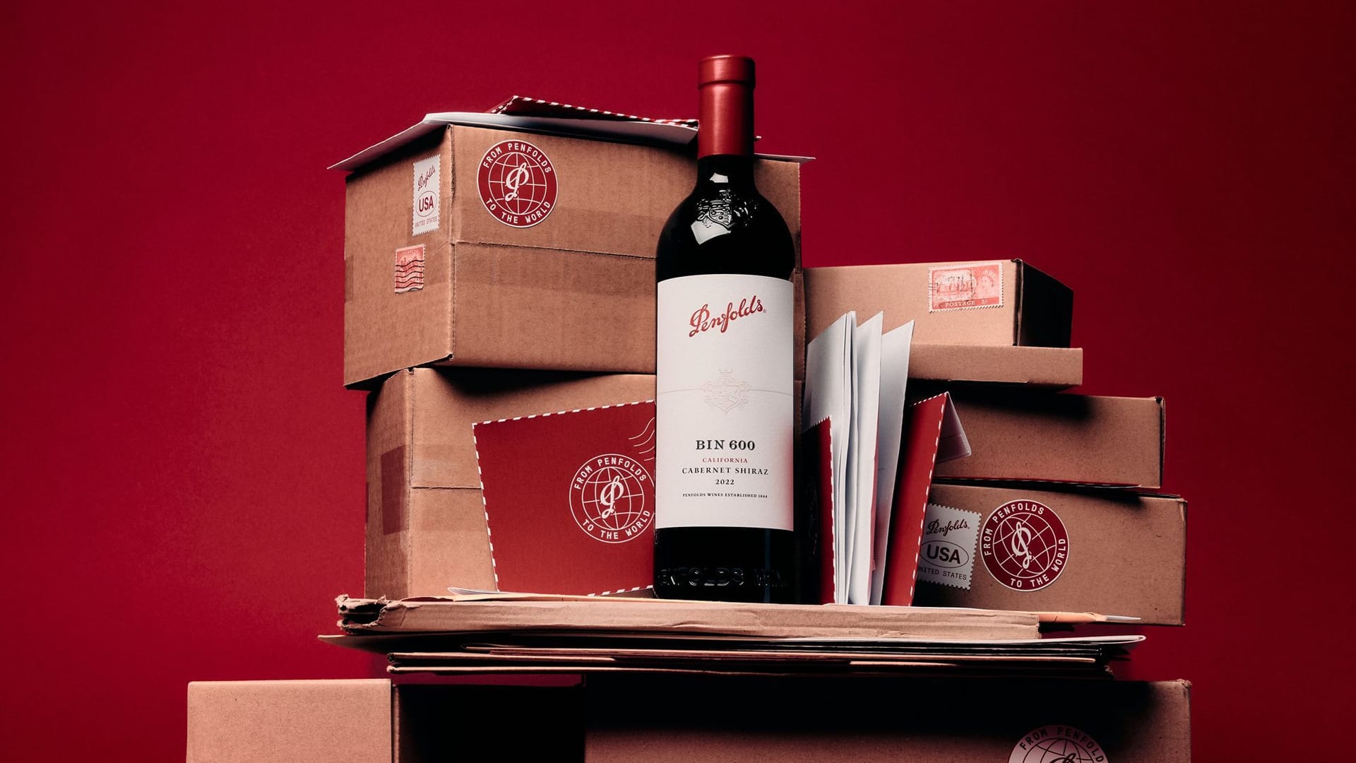 Penfolds wine among packaging boxes and letters
