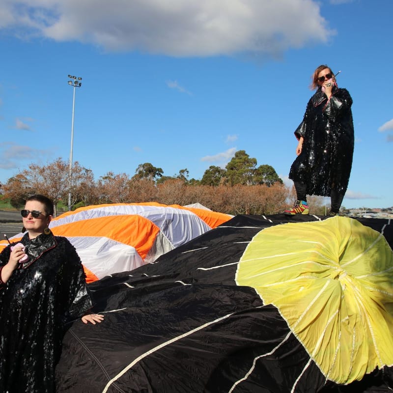 Sisters Akousmatica with parachutes