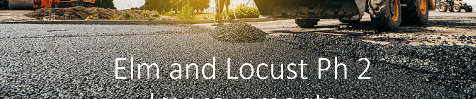 Construction trucks paving road with text "Elm and Locust Ph 2 Improvements" overlaid 