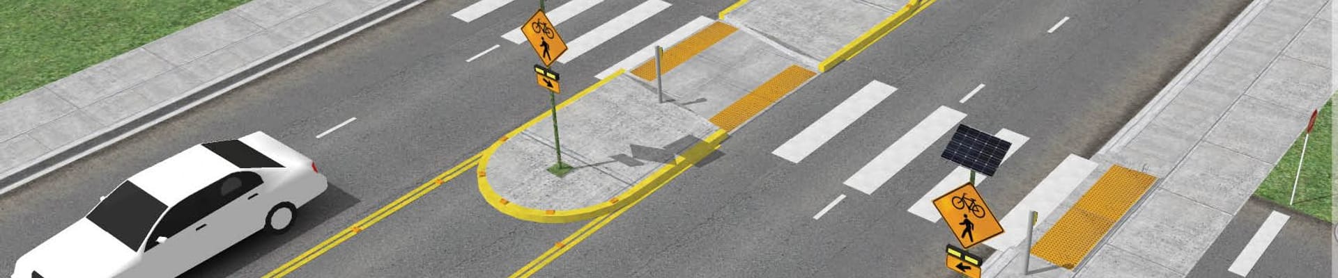 A blind pedestrian crosses the street at a crosswalk