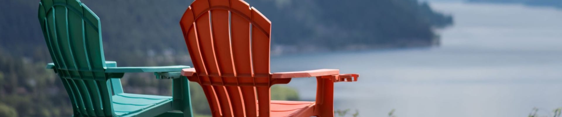 two empty chairs overlooking Shuswap Lake