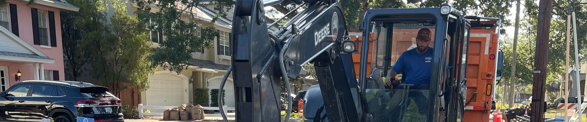 Construction crew works on W Empedrado St.