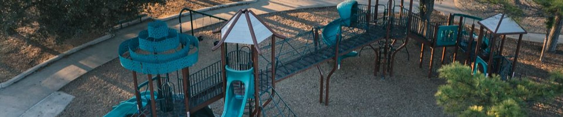 Graphic with two hands making a heart shape with text overlay saying Community Input is Needed, we take it to heart. Parks and Recreation logo on the left side in the middle.