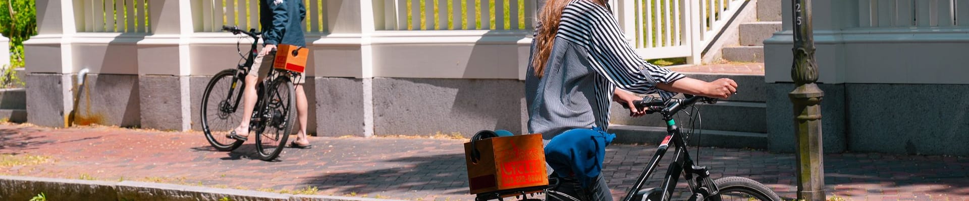 Young woman crossing Upper Main Street