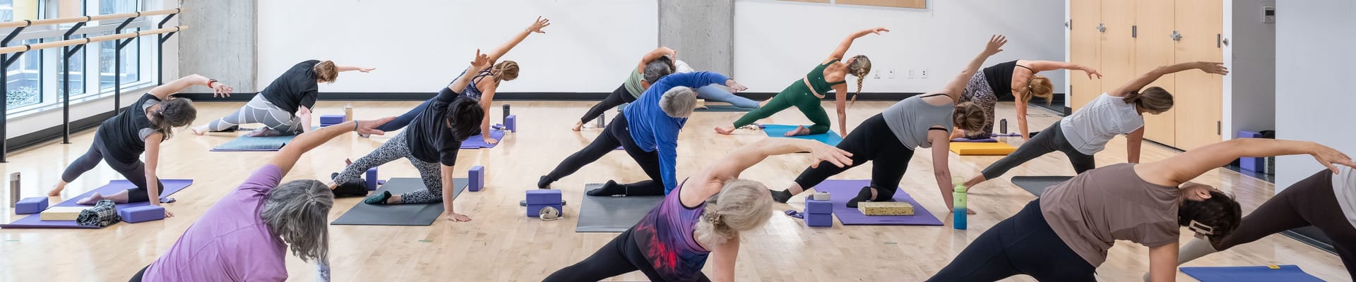 Group of people in yoga class