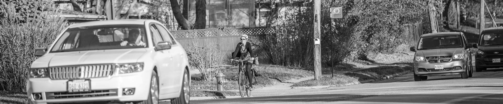 Image of vehicle and bicyclist on Grandview