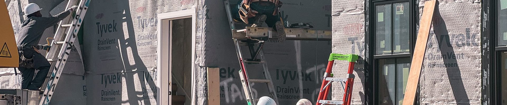 Construction workers at 31 Fairgrounds Rd development
