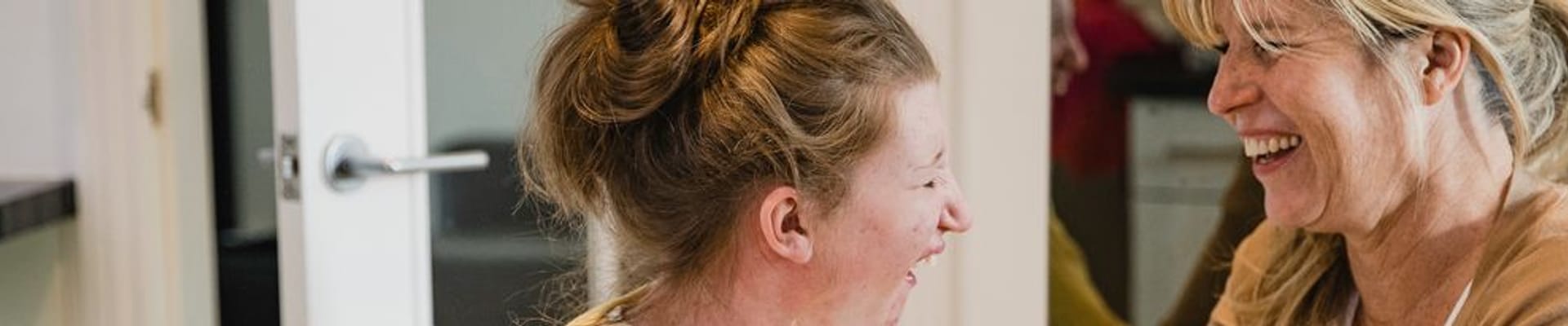 Decorative image of two women smiling 