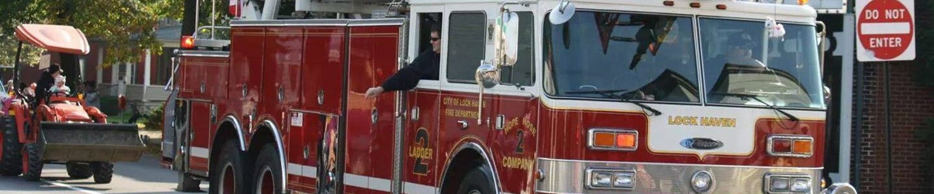 image showing a fire truck on a city street