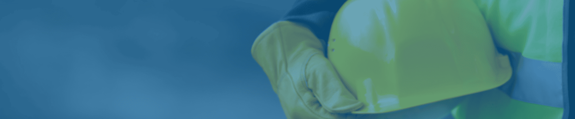 image of a hand holding a hard hat