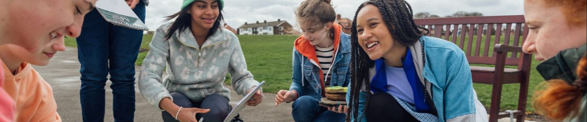 Decorative image to show group of people gathered outdoors 