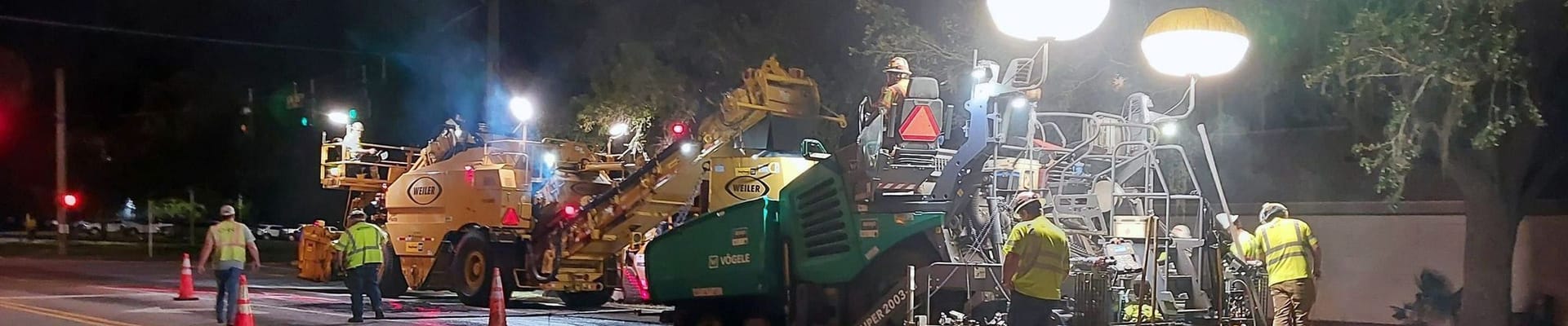 Workers along 20th Ave