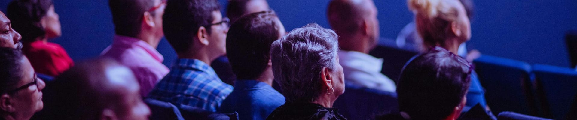 People listening at the event