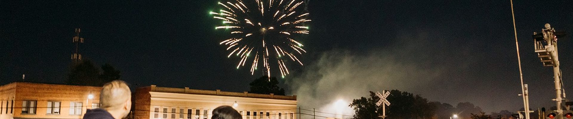 Festival attendees watching fireworks