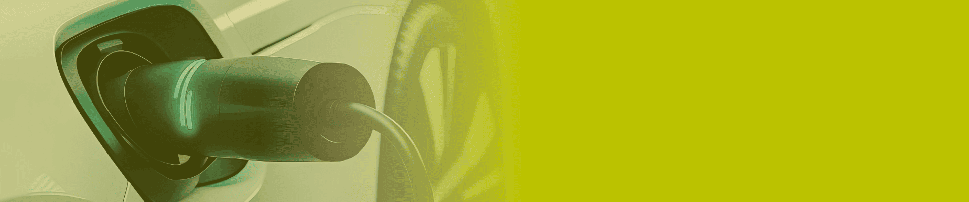 Electric car charger plugged into an electric car.