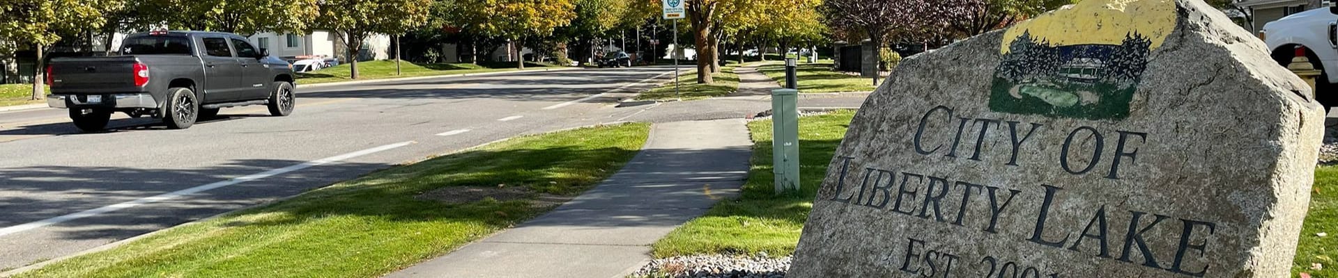 City of Liberty Lake rock sign on street