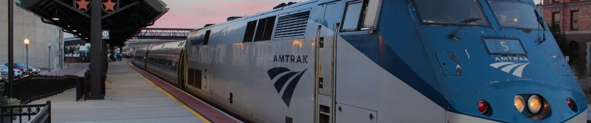 Train at Amtrak station awning with Roanoke sign