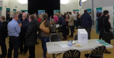 Photo of people at an exhibition