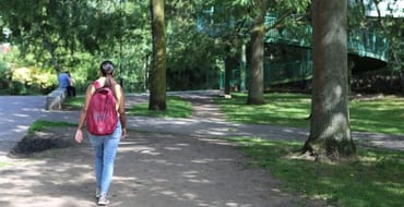 person walking to in person session