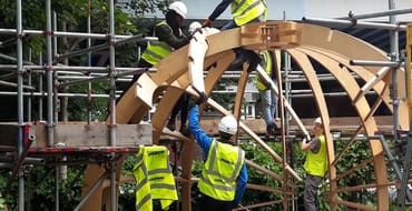 volunteers building a community classroom