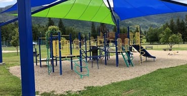 the playground under the shade sail