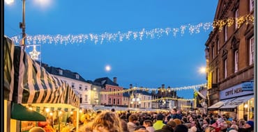 Image of a crowd and Christmas lights