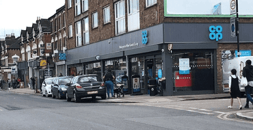 Parked vehicles outside Co-op