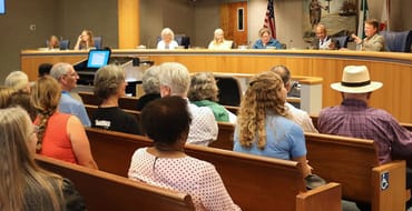 Crowd at a County Commission meeting