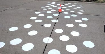 Spots painted on the pavement