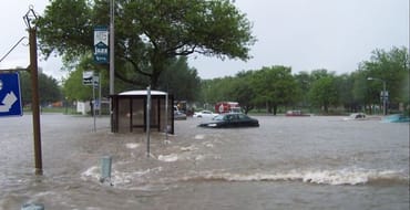 Flooding with cars stuck in high rising water