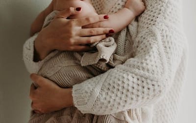 Mum holding a baby