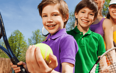 Children with tennis raquet in hands