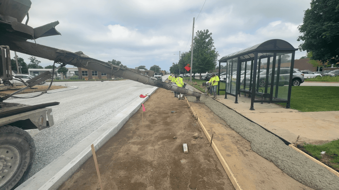New Sidewalk Being Poured near Sophia St, Looking West