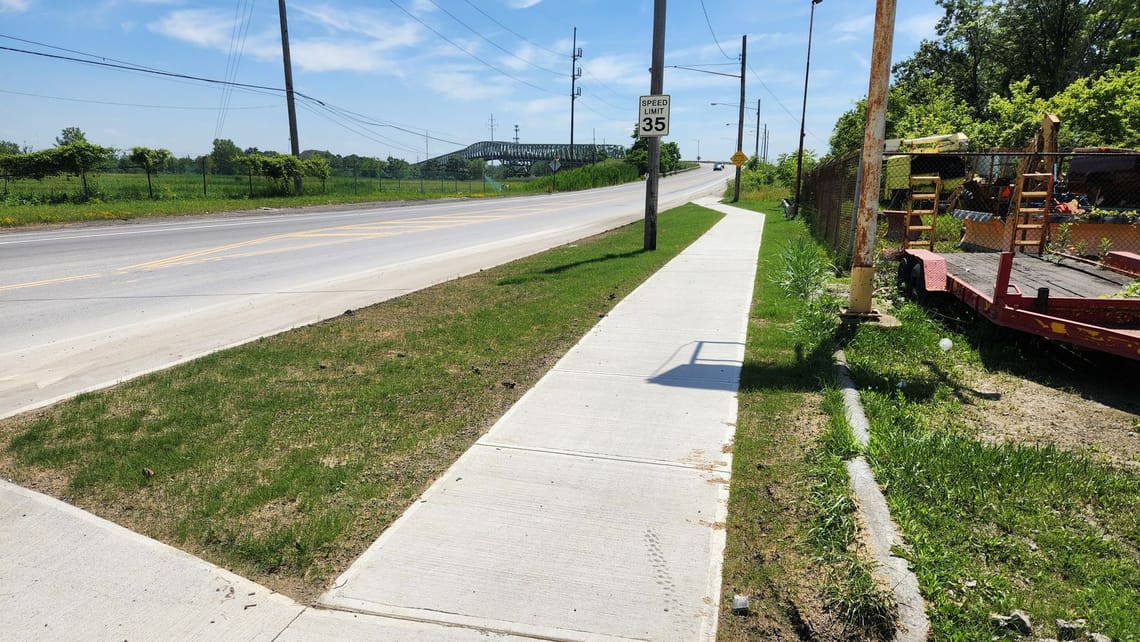 New sidewalk on Henderson Rd.