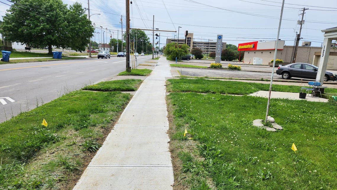 Updated sidewalk on E 21st St