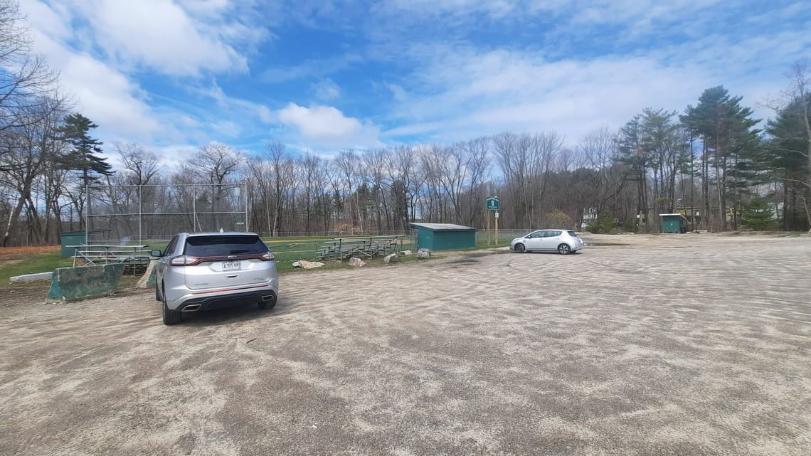 photo of parking lot looking towards little league field. 