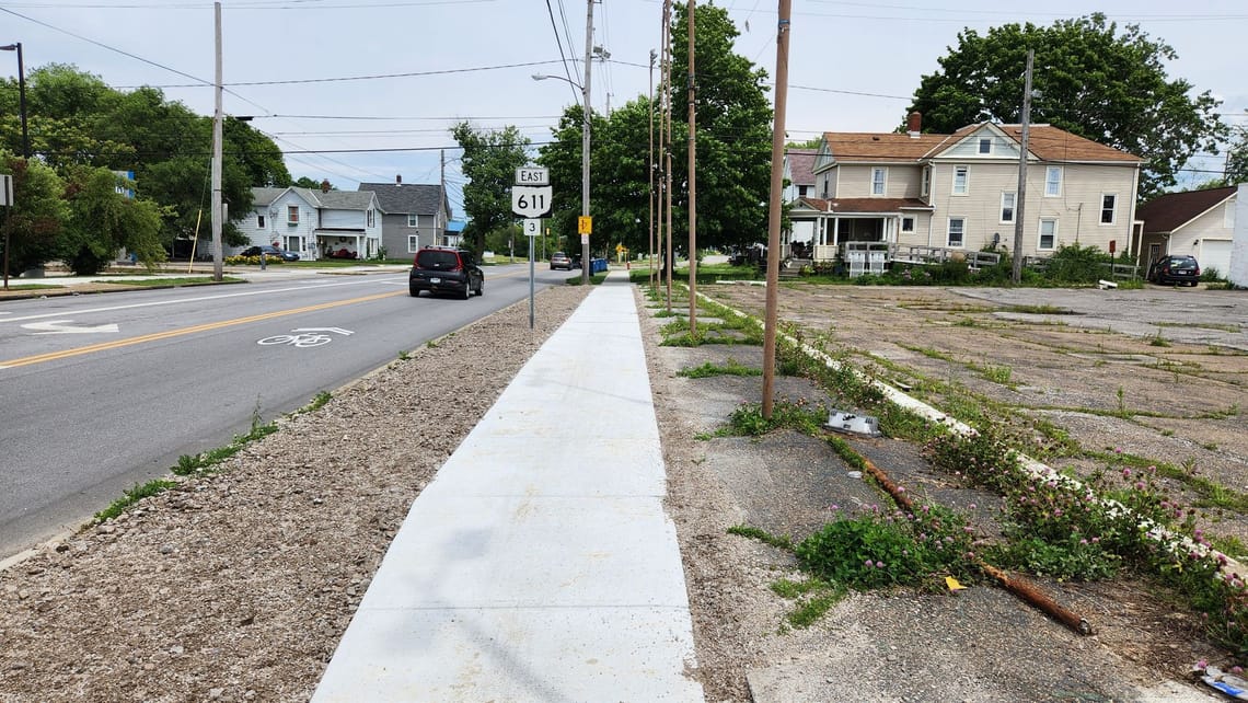 Updated sidewalk on E 21st St