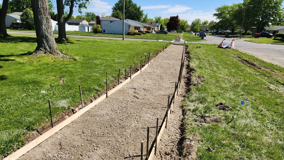 Concrete forms for new walk on Tacoma Ave.