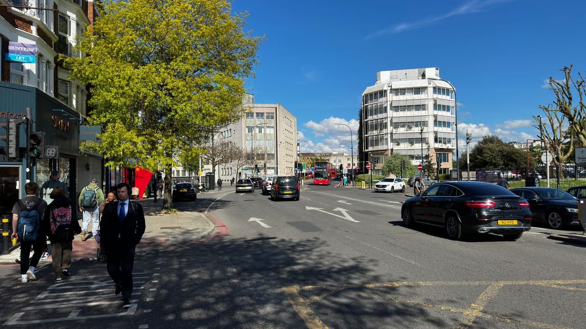 Photo of South Circular road, pedestrians and cars travelling by Laurence House