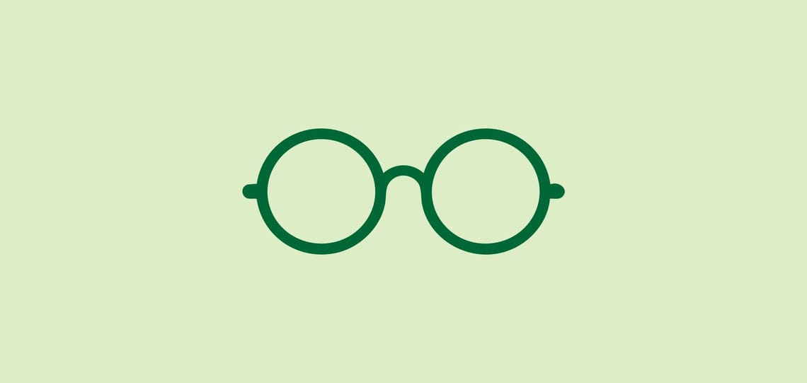 Green goggles icon on light green background