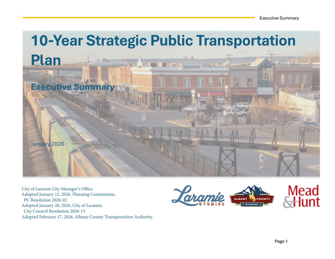 The cover of the 10-Year Strategic Public Transportation Plan showing Laramie from the pedestrian bridge over the railroad tracks.