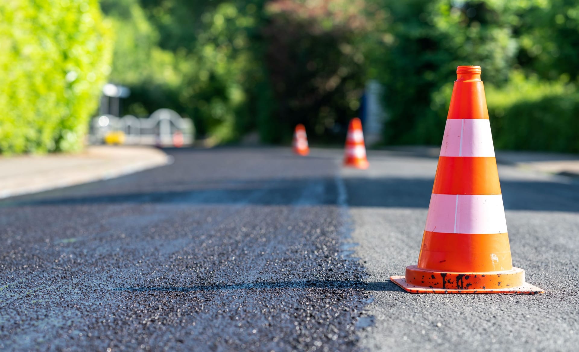 Photograph of construction cones on a street.